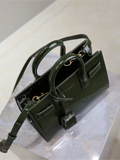 Green patent leather handbag from the Sac De Jour collection
