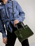 Green patent leather handbag from the Sac De Jour collection